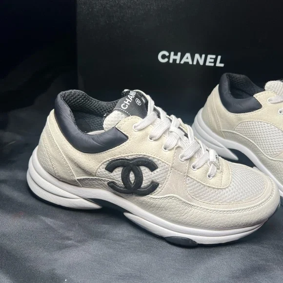 Chanel low top suede sneakers. Comes with Chanel box laces dust bags e